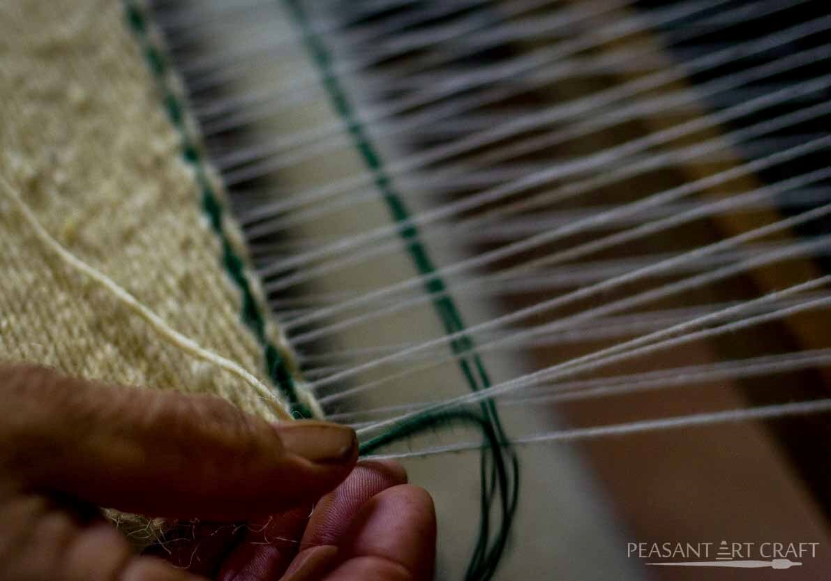 Traditional Textile Weaving Demonstration in Romanian Village of Straja