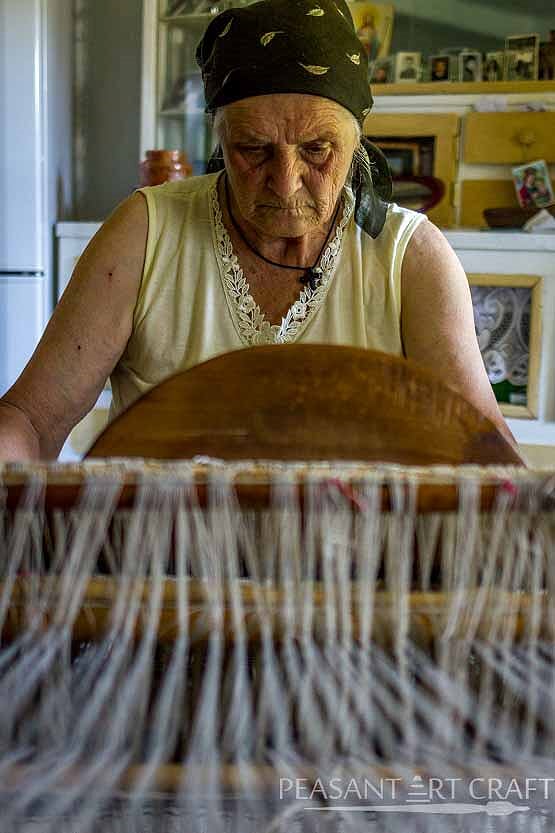 Traditional Textile Weaving Demonstration in Romanian Village of Straja