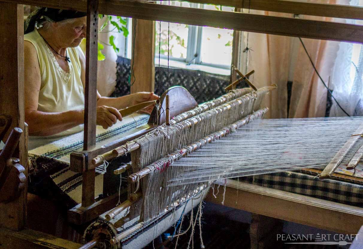 Traditional Textile Weaving Demonstration in Romanian Village of Straja