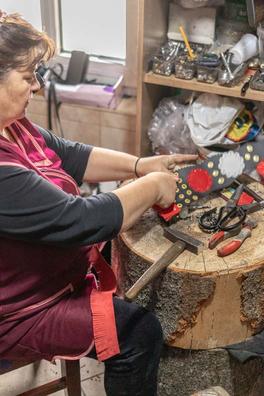 Horse Harness Making With Brass Ornaments in Rural Leather Workshop